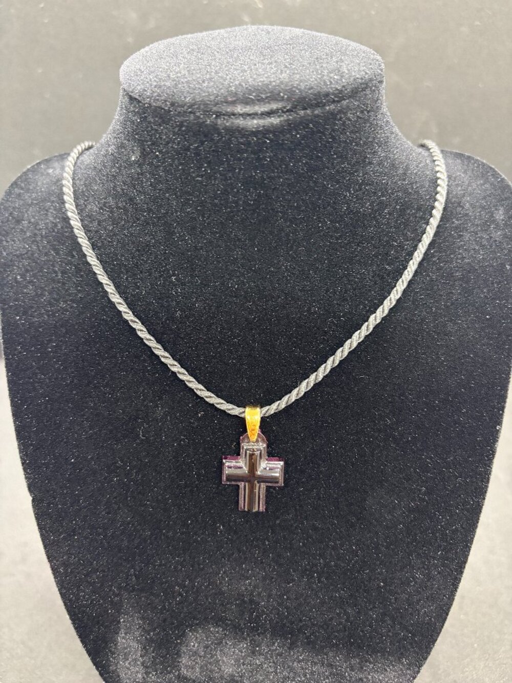 Lalique lavendar crystal cross necklace on black rope
